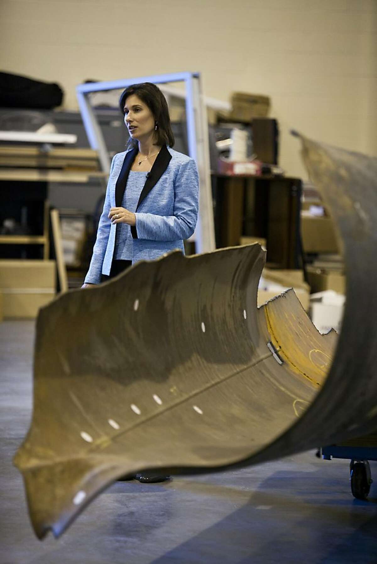 Debbie Hersman, Chairman of the National Transportation Safety Board, discusses the agency's investigation of the San Bruno gas pipleline explosion, the key piece of which she is standing next to, at the NTSB's training center and lab in Ashburn, Va., on Monday, August 29, 2011. The NTSB will hold a meeting to discuss the findings and probable cause of the accident tomorrow.