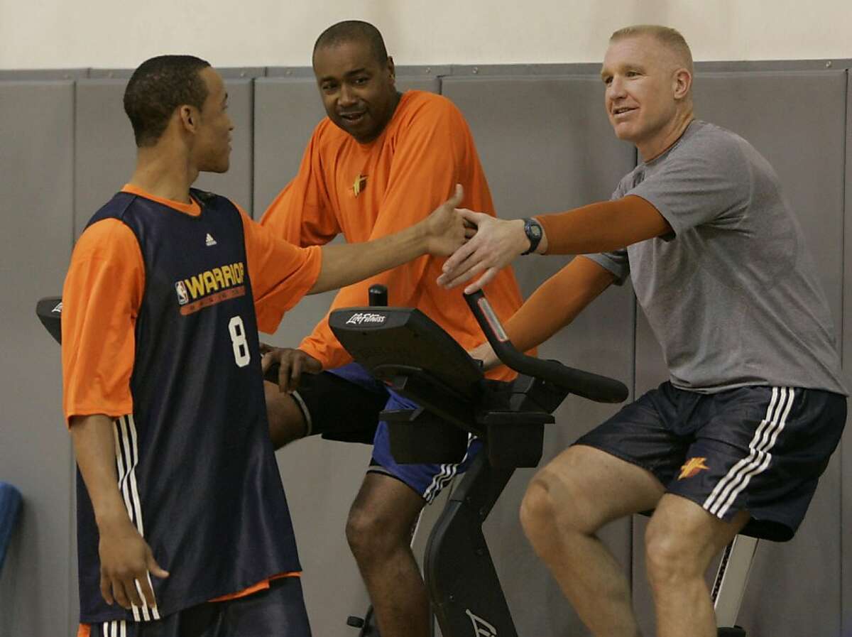 Golden State Warriors guard Monta Ellis gets a handshake from Chris Mullin, Executive Vice President of Basketball Operations. In the center is Rod Higgins (General Manager). The Golden State Warriors hold a press conference and short workout at their practice facility in downtown Oakland, CA on April 26, 2007. Photo by Michael Maloney / San Francisco Chronicle *** Monta Ellis, Chris Mullin, Rod Higgins Ran on: 05-06-2007 Chris Mullin offers a hand to Baron Davis, who has helped establish him as a successful executive. Ran on: 05-06-2007 Chris Mullin offers a hand to Baron Davis, who has helped establish him as a successful executive. Ran on: 06-26-2008 Chris Mullin says he likes to pick guys that have potential to go on and be stars. Ran on: 06-26-2008 Chris Mullin says he likes to pick guys (who) have potential to go on and be stars. Ran on: 08-08-2011 Chris Mullin, who always brought great energy in his playing days, still works out and plays basketball in retirement.
