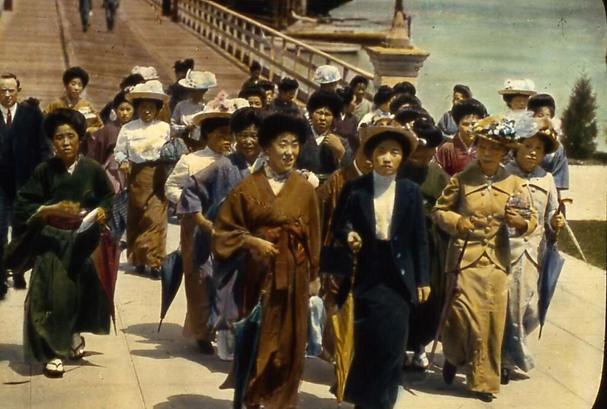 ANGELISLAND_DISEMBARKING Japanese immigrants arrive at Angel Island Immigration Station. About 60,000 people from Japan, including about 20,000 "picture brides," passed through the station between 1910 when the station opened and 1924 when Asian immigration was banned. Credit: California State Parks Collection Note regarding retouching: The photos were provided retouched and it is not believed that it was done by either the Angel Island Immigration Station Foundation or the California State Parks Collection. Ran on: 09-14-2006 Don Nakahata, a UCSF professor, holds a ledger chronicling the arranged marriages of picture brides performed by his grandfather in the early 1900s. Ran on: 09-14-2006 Don Nakahata, a UCSF professor, holds a ledger chronicling the arranged marriages of picture brides performed by his grandfather in the early 1900s. Ran on: 01-21-2010 Japanese women arrive at Angel Island early last century. Some 70,000 Japanese were detained there.