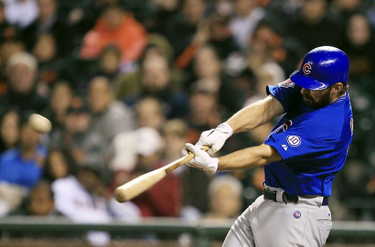 Chicago Cubs' Blake DeWitt hits a three run home run off San Francisco Giants starting pitcher Tim Lincecum during the seventh inning of a baseball game in San Francisco, Monday, Aug. 29, 2011. (AP Photo/Marcio Jose Sanchez)