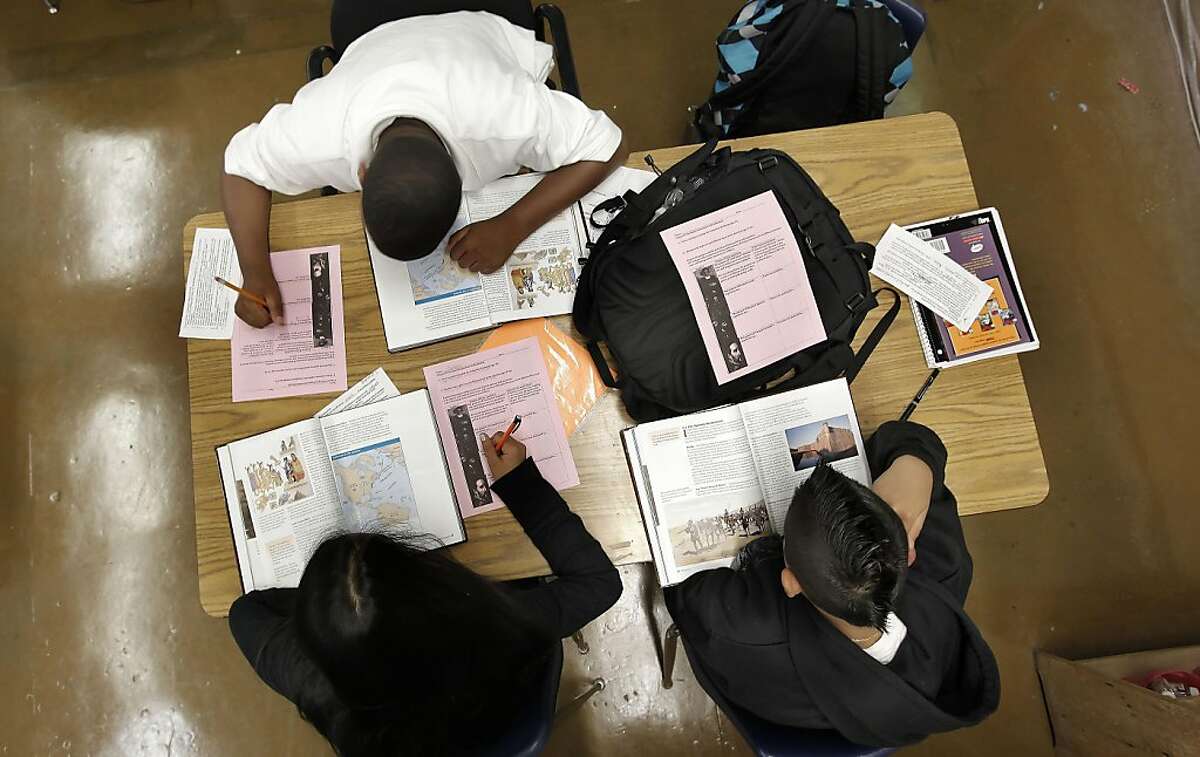 8th grade students busy at work during social studies class at Everett Middle School in San Francisco, Ca., on Tuesday August 30, 2011. Everett is one of nine schools in the school district with a massive federal grant to improve student performance. The school is among those that didn't follow the federal rules and is technically at risk of losing the second year of funding.