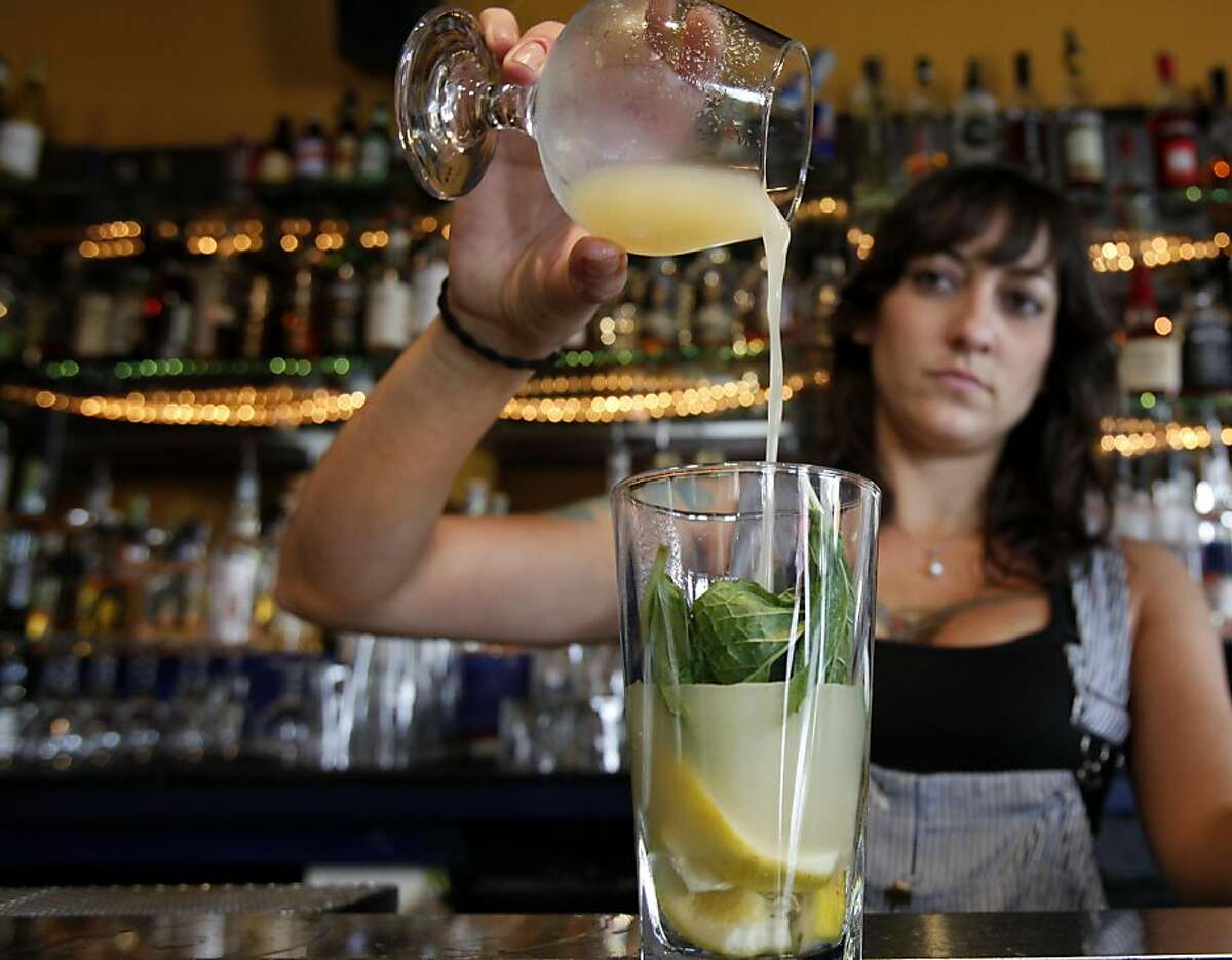 Bartender Amber Triolo of Mars Bar adds ginger to a cocktail. She would infuse ginger with alcohol if the new law is passed. At Mars Bar and Restaurant in San Francisco, Calif. bartender Amber Triolo makes her drinks fresh, but would like to infuse alcohol if it becomes legal in the state. The California State legislature is debating a new measure which would allow bars to legally infuse alcohol with fruit and herbs.