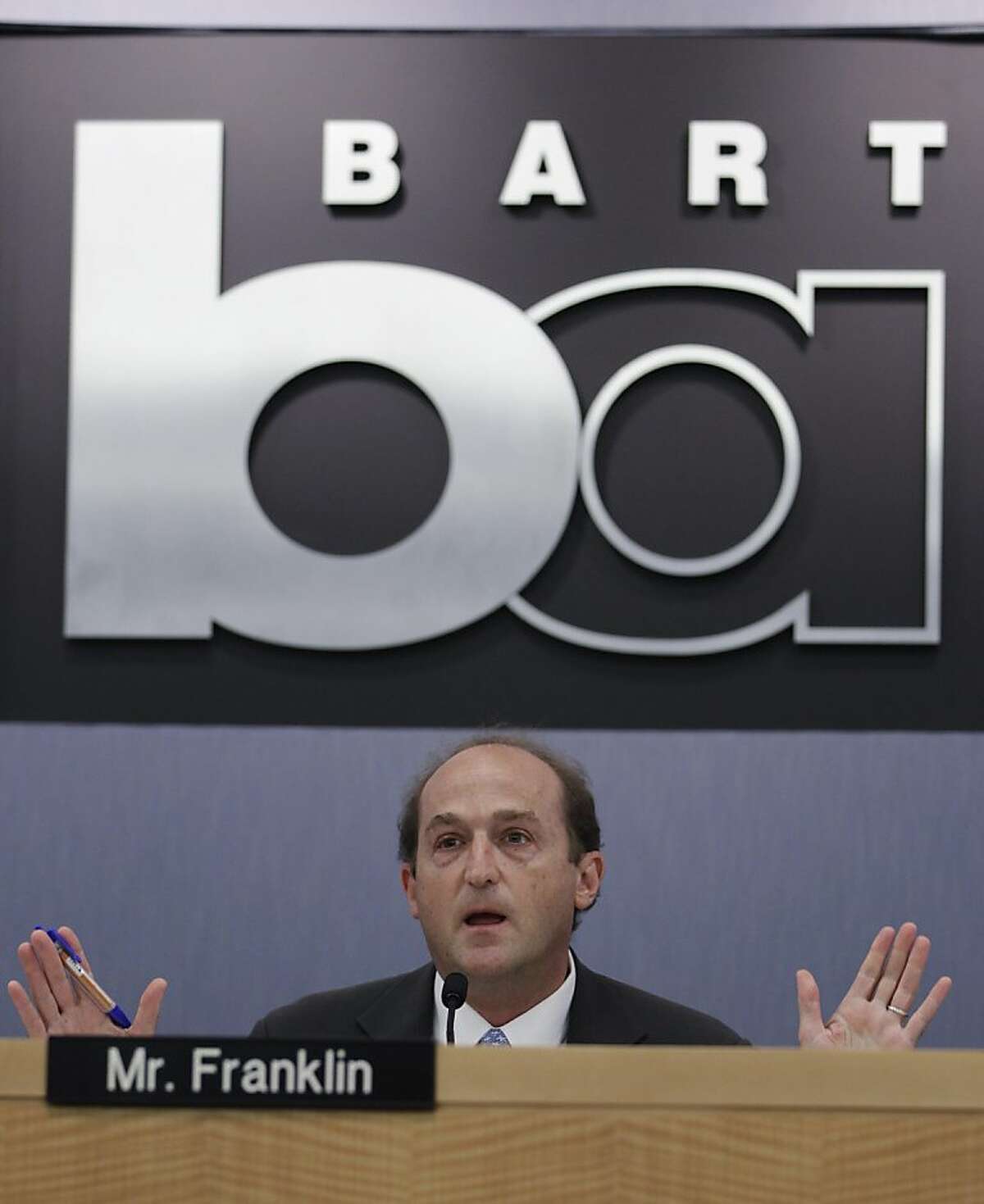 Bay Area Rapid Transit (BART) agency board president Bob Franklin gestures during a public meeting at BART headquarters in Oakland, Calif., Wednesday, Aug. 24, 2011 to help ease tensions over whether there should be a policy on cutting wireless access to its stations during protests. The discussion was whether it wants to continue using the tactic, which drew unfavorable comparisons to Hosni Mubarak's attempts to cut Internet access to most of Egypt to quell demonstrations protesting his regime. (AP Photo/Paul Sakuma)