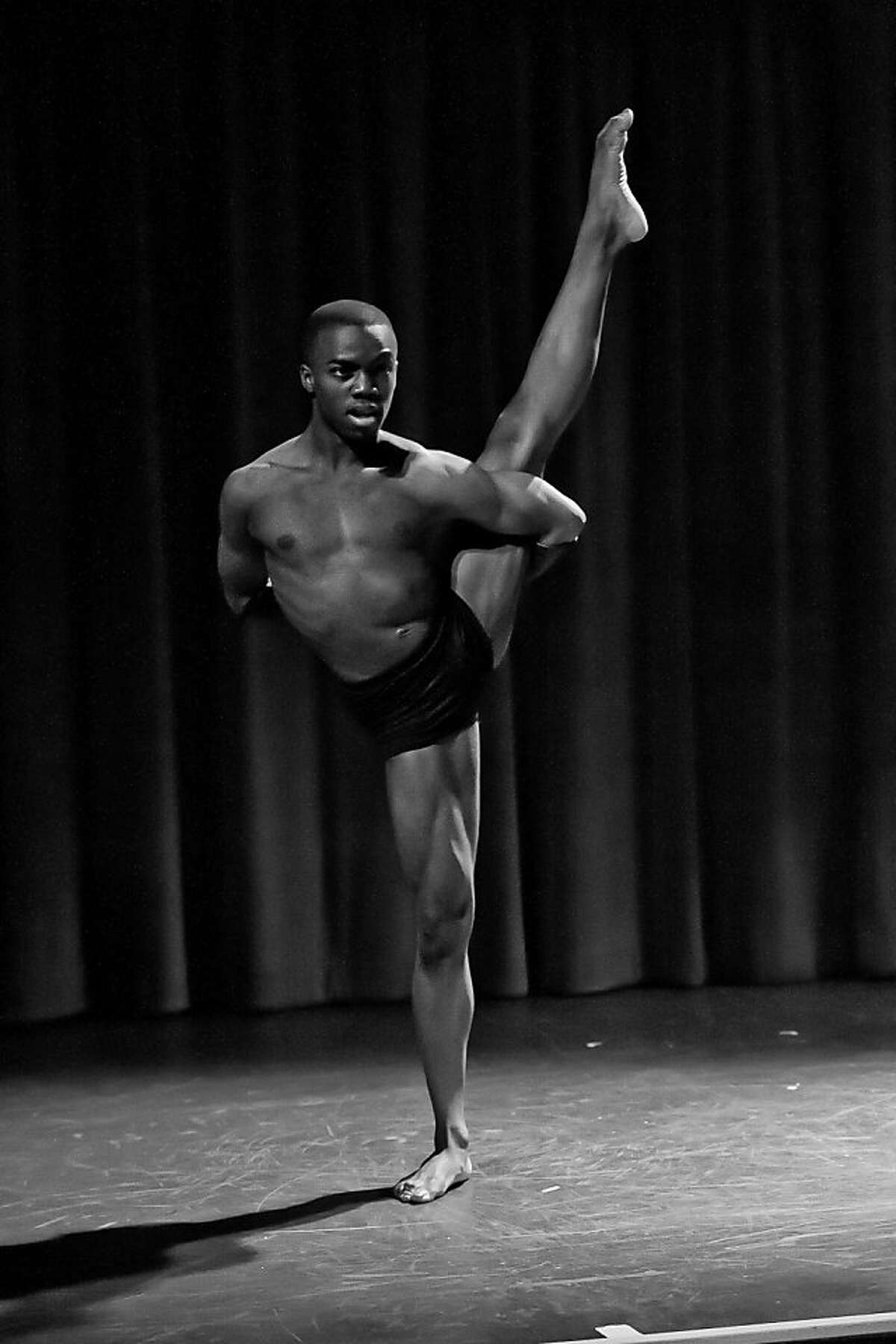 Darius Drooh, winner of the Beach Blanket Babylon Foundation's dance scholarship, rehearses at Club Fugazi in S.F. before the competition.