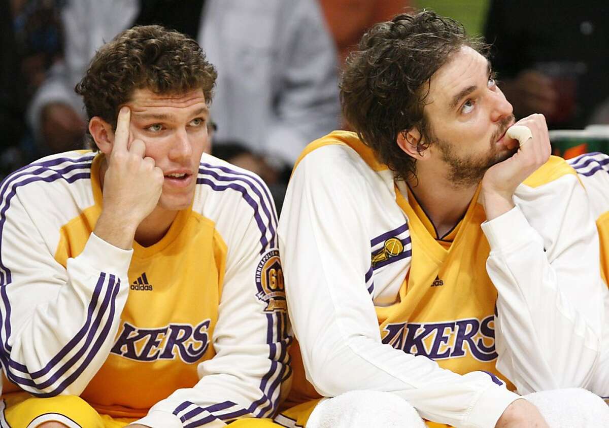 Los Angeles Lakers Luke Walton and Pau Gasol (R) sit on the bench while their team plays the Boston Celtics during the second half in Game 4 of the NBA Finals basketball championship in Los Angeles June 12, 2008. REUTERS/Lucy Nicholson (UNITED STATES) Ran on: 06-13-2008 Luke Walton (left) and Pau Gasol are relegated to sideline observers during their teams loss.