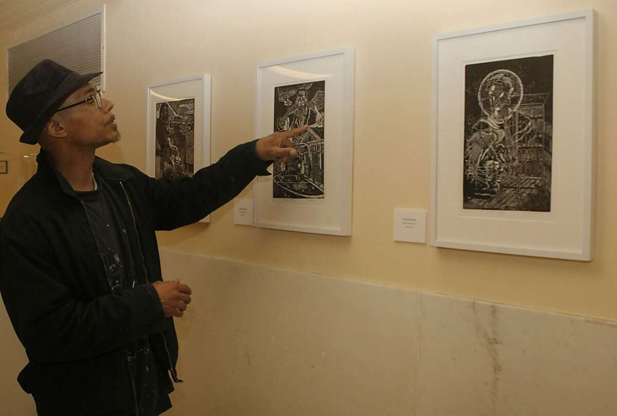 Ronnie Goodman points to one of his block prints called "Folsom Blues, 2011" that is displayed in San Francisco City Hall in San Francisco Calif., on August 10, 2011. Goodman learned block printing while serving a 10 year sentence in San Quentin for first degree burglary.