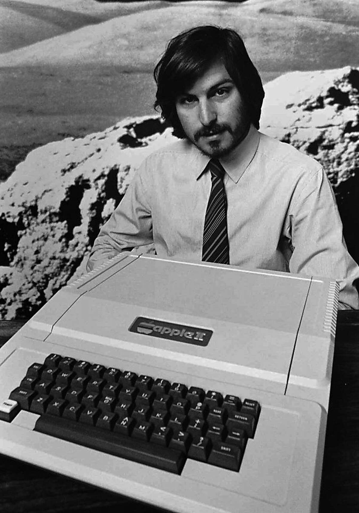 This is a 1977 photo of Apple Computer Inc. founder Steve Jobs as he introduces the new Apple II in Cupertino, Calif. Apple Computer was formed 20 years ago, on April Fool's Day in 1976. This is a 1977 photo of Apple Computer Inc. founder Steve Jobs as he introduces the new Apple II in Cupertino, Calif. Apple Computer was formed 20 years ago, on April Fool's Day in 1976. (AP Photo/Apple Computers Inc., file) Ran on: 01-09-2006 Ran on: 03-26-2006 Apple co-founder Steve Jobs introduces the new Apple II computer in Cupertino.