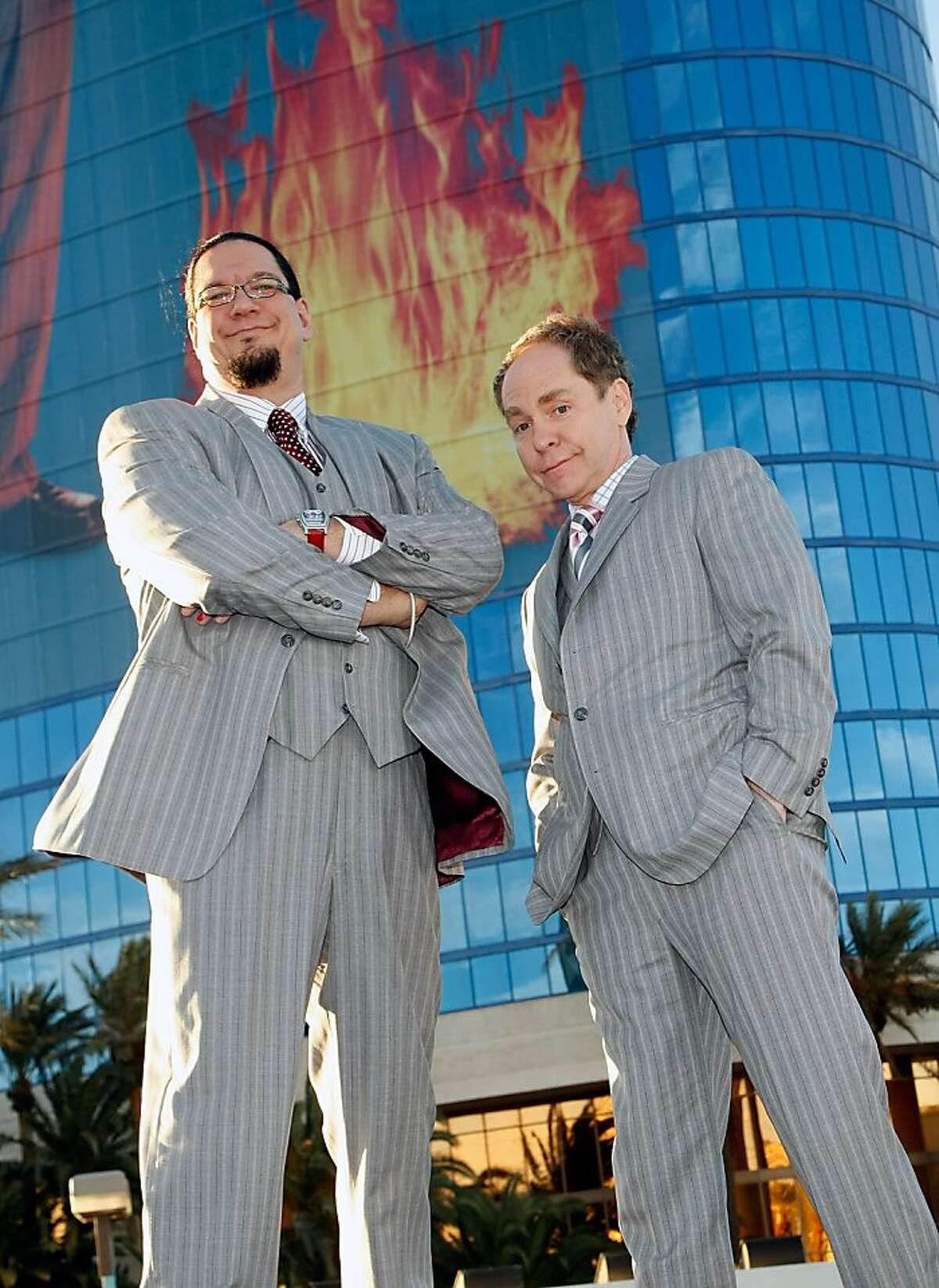 Penn Jillette (L) and Teller of the comedy/magic team Penn & Teller appear at the Rio Hotel & Casino. LAS VEGAS - MARCH 3: Penn Jillette (L) and Teller of the comedy/magic team Penn & Teller appear at the Rio Hotel & Casino to celebrate the duo's 35 years performing together March 3, 2009 in Las Vegas, Nevada. A 28-story tall building wrap of their likeness was unveiled on the side of the Rio where the pair currently headlines a show. (Photo by Ethan Miller/Getty Images)