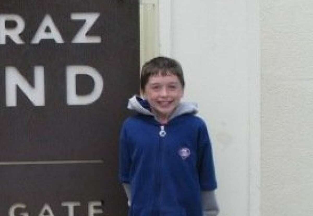Ryan White, 9, who was hit by an allegedly drunk hit-and-run driver in San Francisco on Thursday, Aug. 4 at Mission and New Montgomery streets, is pictured here at Alcatraz earlier that same day. Ran on: 08-10-2011 Ryan White, 9, suffered multiple injuries when he was hit.