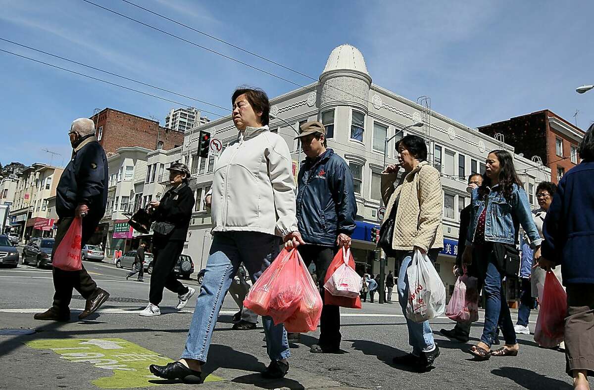 SAN FRANCISCO - JUNE 02: Pedestrians carry plastic grocery bags as they cross the street June 2, 2010 in San Francisco, California. California may become the first state in the nation to ban plastic bags from grocery and convenience stores. In addition to the ban, consumers would be charged 5 cents per paper bag if they do not bring their own reusable bags. Assembly bill AB1998 is supported by Gov. Arnold Schwarzengger and is expected to pass an assembly vote this week before moving to the State Senate for a vote later this year. (Photo by Justin Sullivan/Getty Images) Ran on: 06-08-2010 Photo caption Dummy text goes here. Dummy text goes here. Dummy text goes here. Dummy text goes here. Dummy text goes here. Dummy text goes here. Dummy text goes here. Dummy text goes here.###Photo: edit08_plastic_PH1275350400Getty Images North America###Live Caption:SAN FRANCISCO - JUNE 02: Pedestrians carry plastic grocery bags as they cross the street June 2, 2010 in San Francisco, California. California may become the first state in the nation to ban plastic bags from grocery and convenience stores. In addition to the ban, consumers would be charged 5 cents per paper bag if they do not bring their own reusable bags. Assembly bill AB1998 is supported by Gov. Arnold Schwarzengger and is expected to pass an assembly vote this week before moving to the State Senate for a vote later this year.###Caption History:SAN FRANCISCO - JUNE 02: Pedestrians carry plastic grocery bags as they cross the street June 2, 2010 in San Francisco, California. California may become the first state in the nation to ban plastic bags from grocery and convenience stores. In addition to the ban, consumers would be charged 5 cents per...