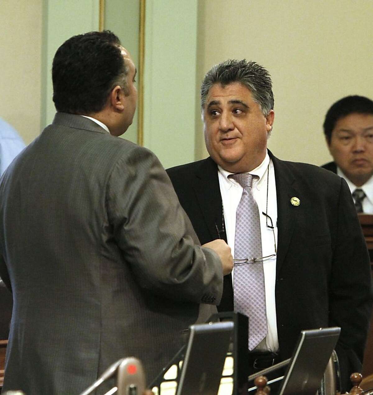 In this photo taken March 16, 2011, Assemblyman Anthony Portantino, D- La Canada Flintridge, right, talks with Assembly Speaker John Perez, D-Los Angeles, during a debate over the state budget at the Capitol in Sacramento. Portantino said his bill to push back school start times at middle and high schools in the state is dead for the year after intense lobbying against the measure in recent days.