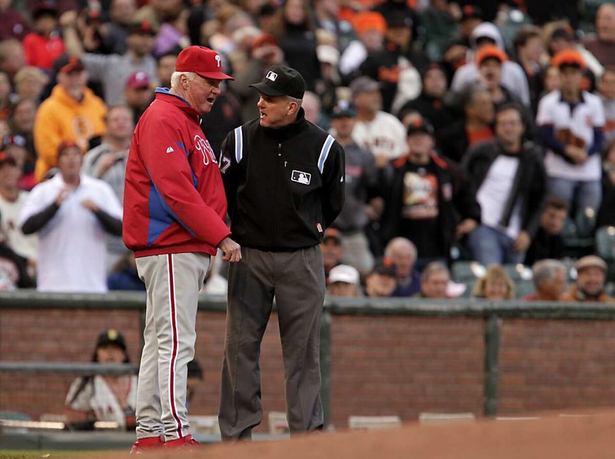 Philadelphia Philles Manager Charlie Manuel argues with umpire Mike Everitt after Jimmy Rollin is called out at third base, against the San Franicsco Giants Thursday August 4, 2011, in San Francisco, Calif. The Philles defeatedthe Giants 3-0.