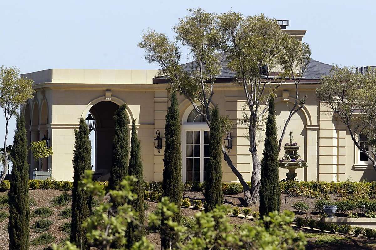 Exterior view of a $100 million mansion in Los Altos Hills, Calif., Thursday, March 31, 2011. A Russian billionaire investor has purchased a lavish, 25,500-square-foot mansion in Silicon Valley for $100 million, believed to be the most ever paid for a single-family home in the United States. The Wall Street Journal reports that 49-year-old Yuri Milner, an investor in Facebook, Groupon and Zynga, has no immediate plans to move into the home.