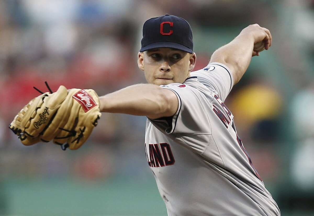 Cleveland Indians starting pitcher Justin Masterson delivers to the Boston Red Sox during the first inning of a baseball game at Fenway Park in Boston on Thursday, Aug. 4, 2011.