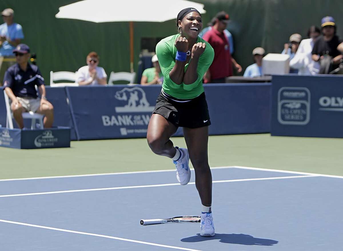Serena Williams reacts after defeating Marion Bartoli, 7-5, 6-1, in the finals of the Bank of the West Classic, Sunday July 31, 2011, in Stanford, Calif.