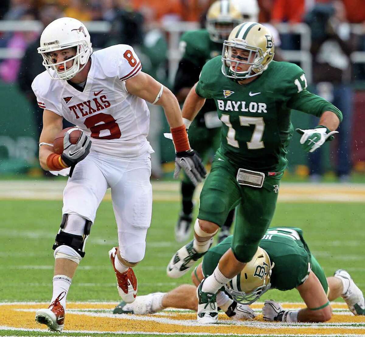 The Longhorns' Jaxon Sipley gets loose on a catch in the first half as Baylor hosts Texas at Floyd Casey Stadium in Waco on Saturday, Dec. 3, 2011.
