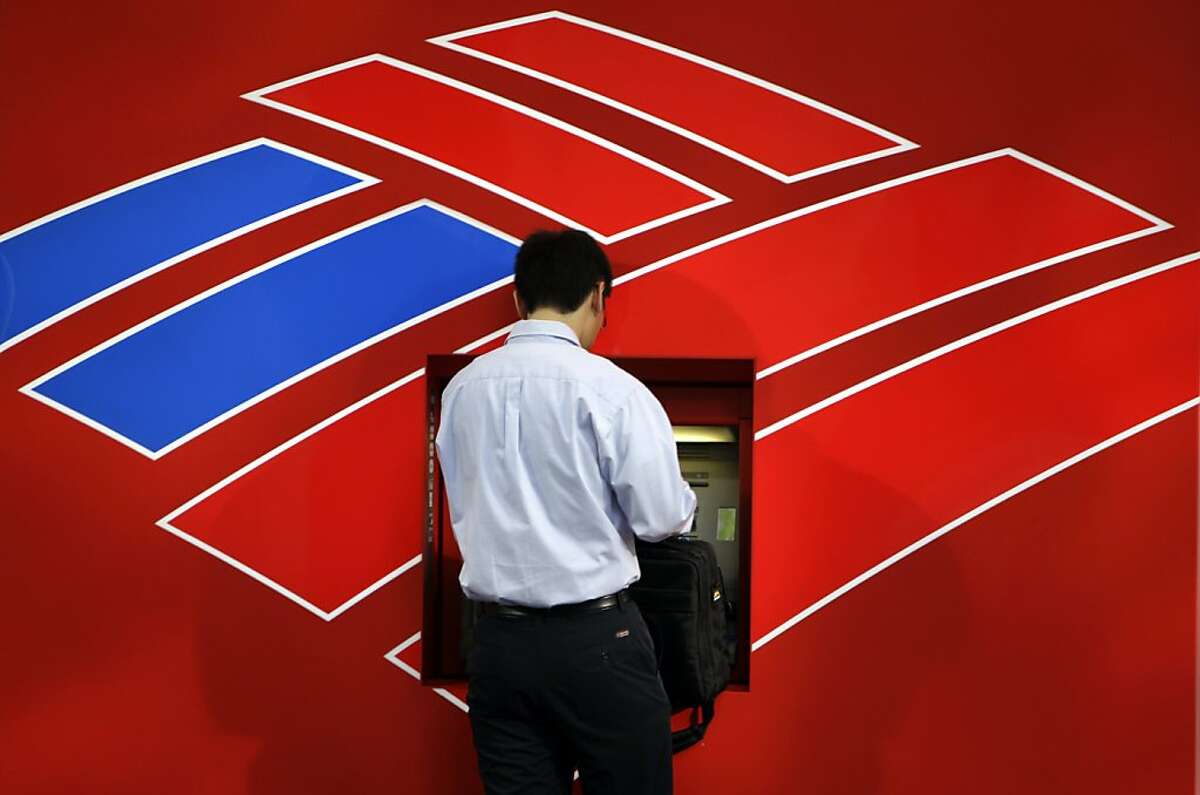 A customer uses a Bank of America ATM in Charlotte, N.C., Friday, July 17, 2009. Bank of America became the third big bank with better than expected earnings, reporting a $2.42 billion second-quarter profit even as losses from failed loans continued to rise. (AP Photo/Chuck Burton) Ran on: 07-18-2009 A customer uses a Bank of America ATM in Charlotte, N.C. The company reported better-than-expected results despite losses from bad loans. Ran on: 11-09-2010 Bank of America needs to meet a Dec. 31 deadline to escape the Troubled Asset Relief Program.