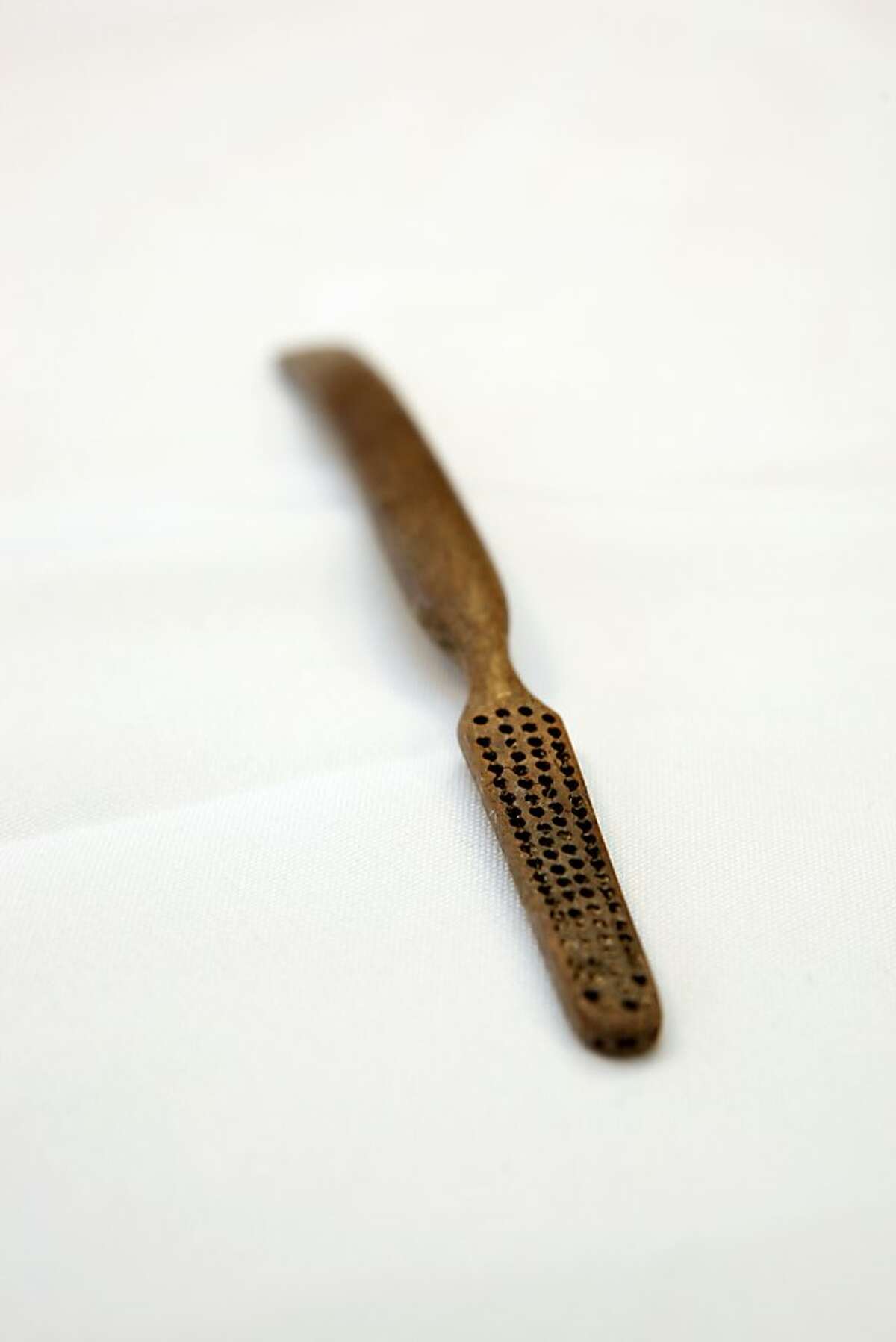 A bone toothbrush from the second half of the 19th century, found at 45 Minna Street, and was shown to the Chronicle on Wednesday, November 30, 2011 in San Francisco, Calif.