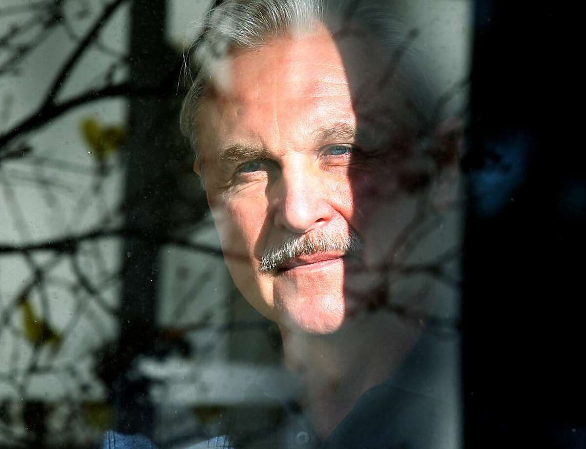 Monty Patterson peers out his living room window Tuesday November 29 2011. Patterson daughter Holly was the first woman in the United States to die from complications of taking the so-called abortion pill. Patterson, a former construction worker, has become something of a scientist and lobbyist, as he has worked relentlessly to raise awareness around the risks of the pill. He recently set up a website, www.abortionpillrisks.org.