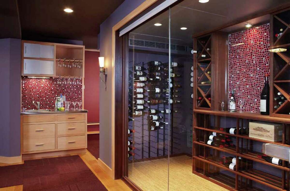 Karp Associates, Inc. was honored with a HOBI award for a home theater and wine cellar.
