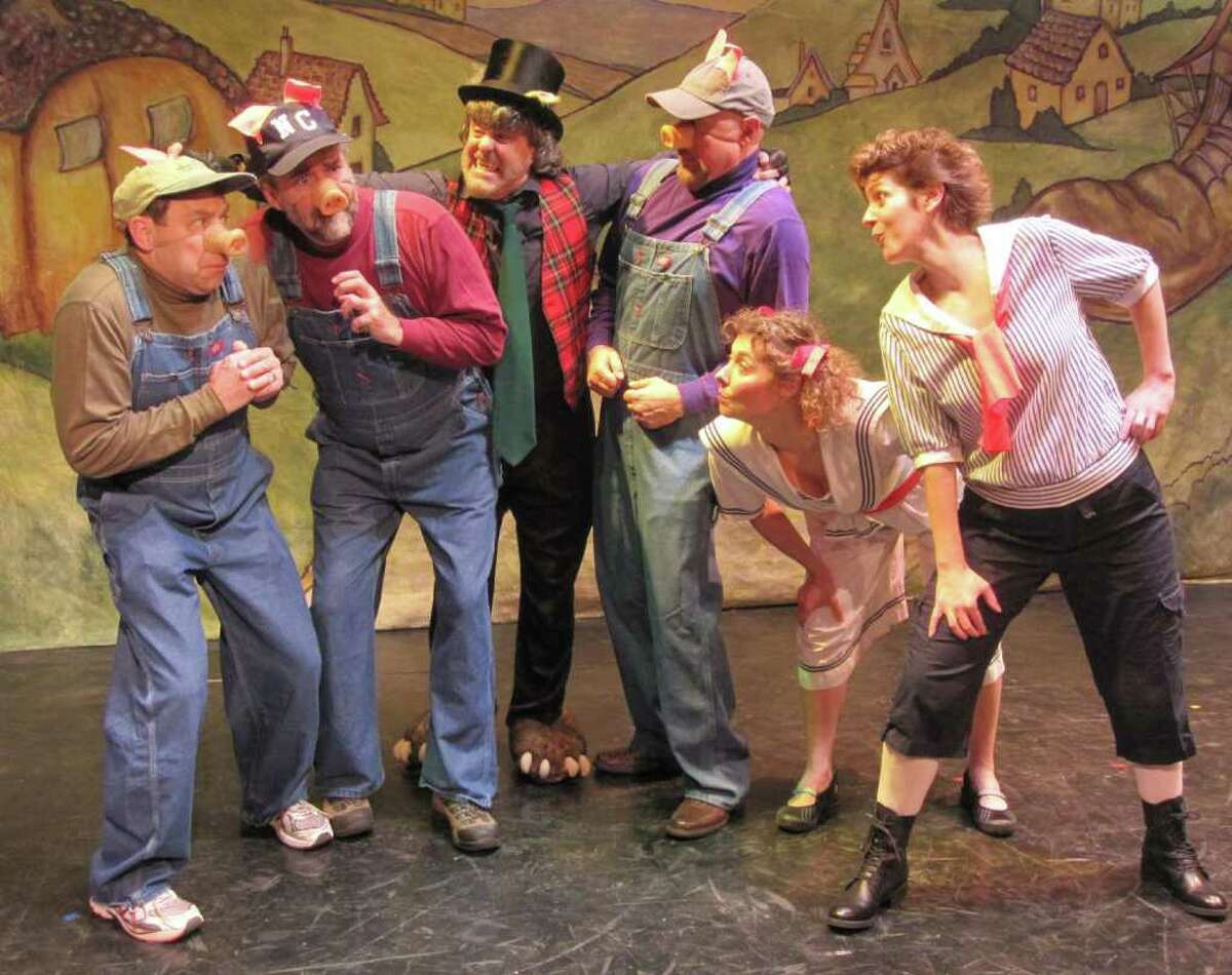 The Three Pigs (Kevin McDonough, Tim Cronin and Fred Seufert) and the Big Bad Wolf (Dennis McGrath) are taunted by Jill (Jessie Gilbert) and Jack (Donna Glen) in the Town Players of New Canaanís family holiday show, "Little Red Riding Hood, A Panto."