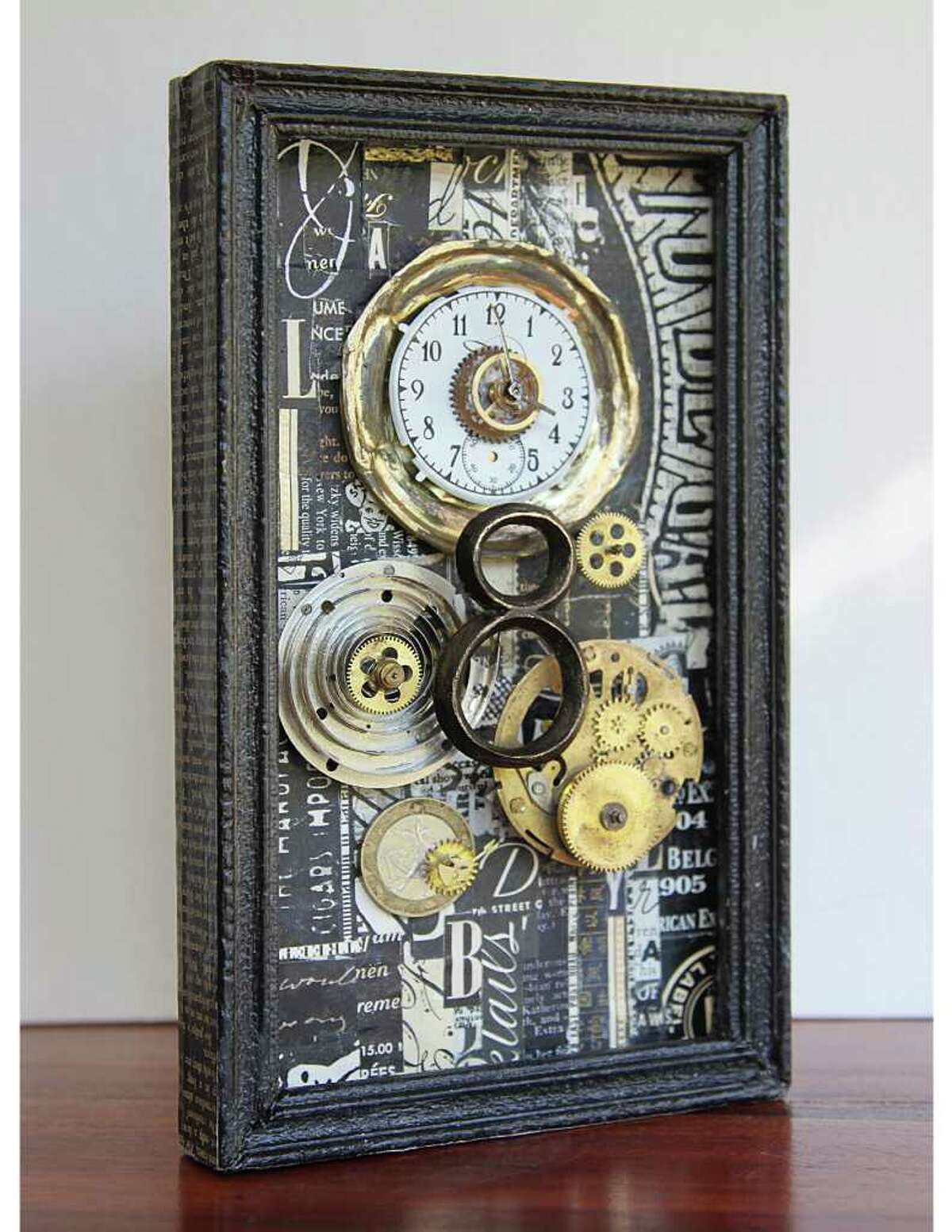 Wilton resident Amy Schottís From Here to There "No. 8," a black and white work with antique clock parts.