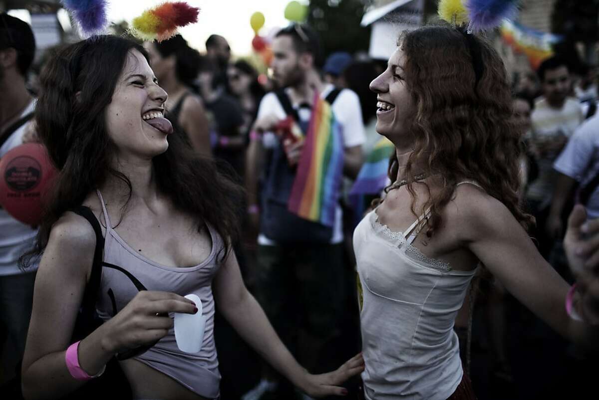 Israelis take part in Jerusalem's annual gay pride parade on July 28, 2011. TOPSHOTS/