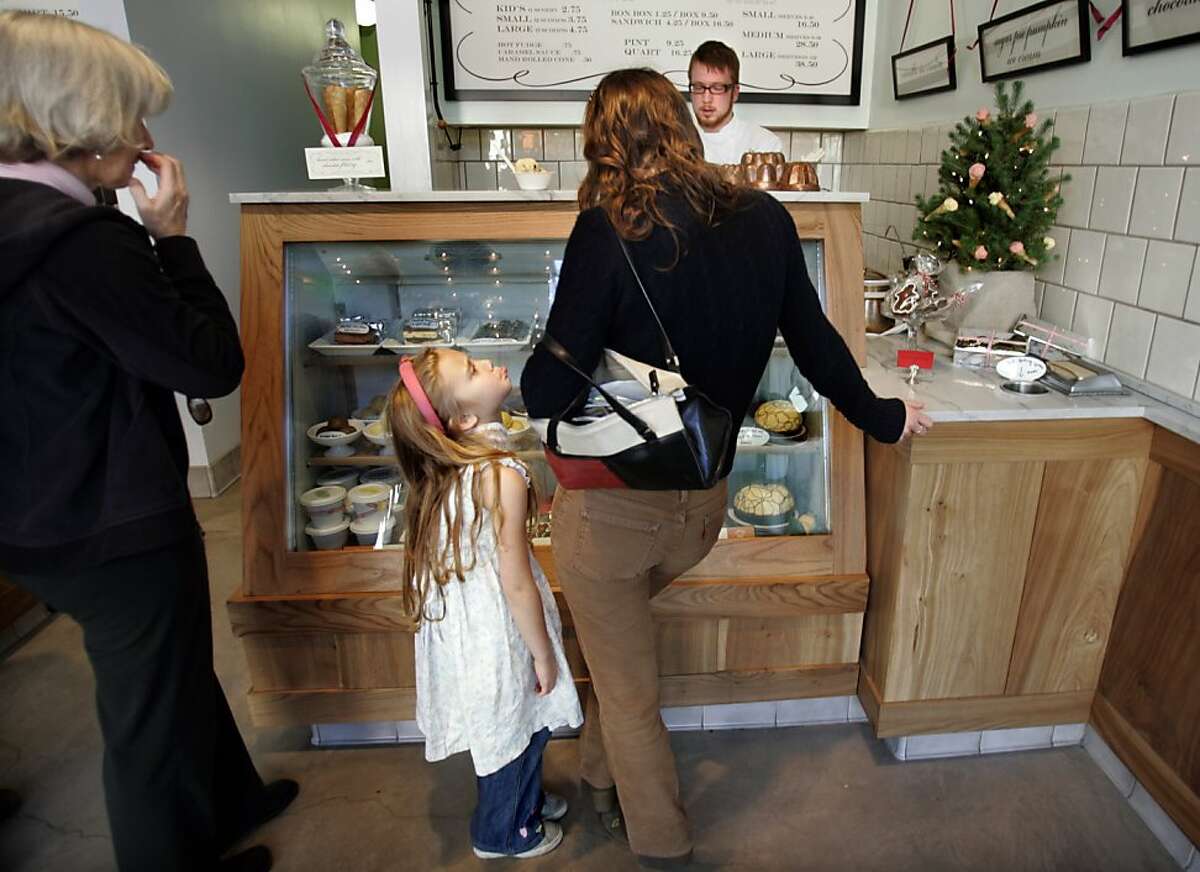 A mother and daughter check out the display at Ici Ice Cream on College Avenue in Berkeley.