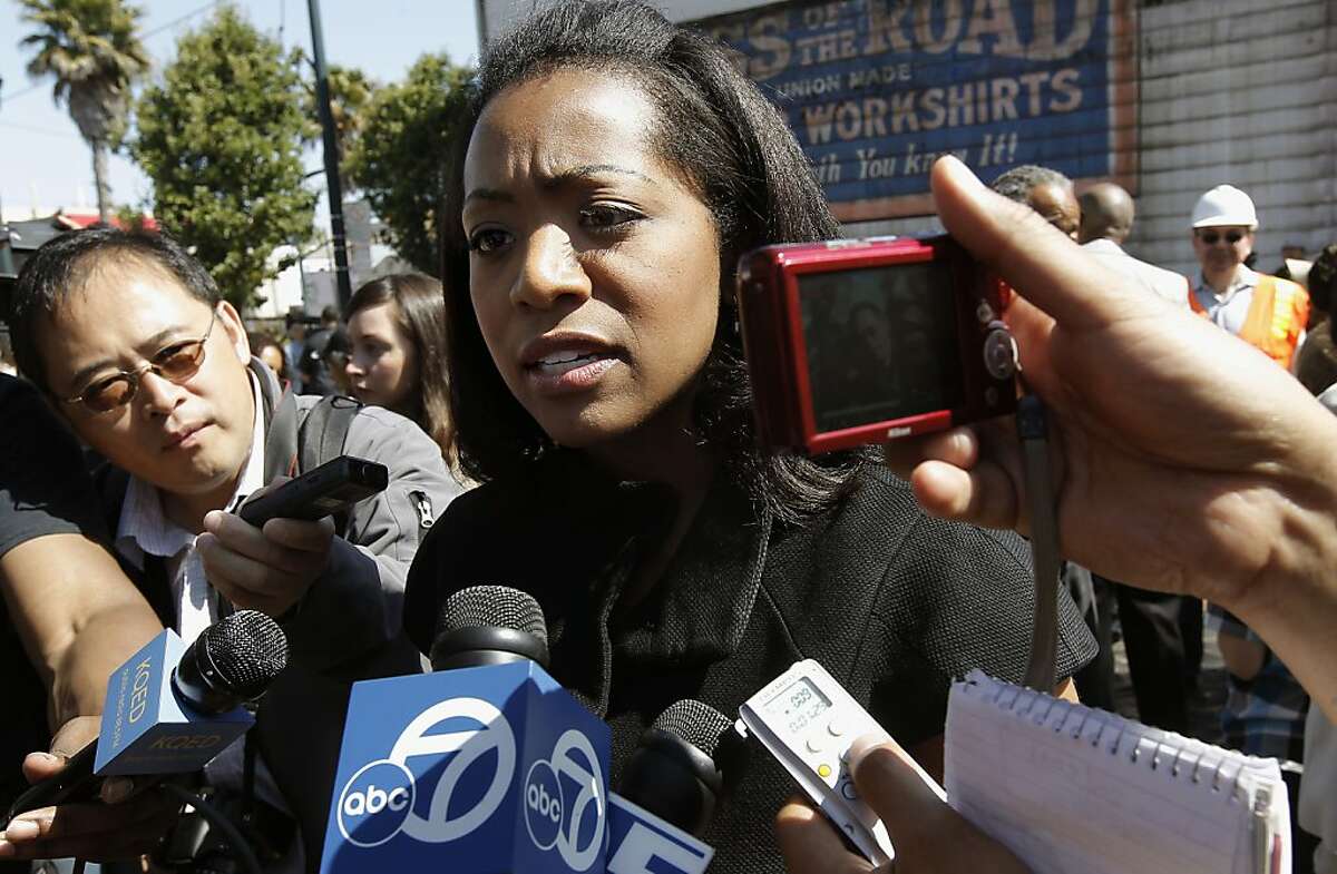 District 10 Supervisor, Malia Cohen, is surrounded by reporters, on Friday July 22, 2011, in San Francisco, Ca., as she is questioned about recent shootings in the Bayview neighborhood. African American's are losing political power in San Francisco due to the shrinking population. Cohen in the lone African American on the Board of Supervisors in San Francisco.