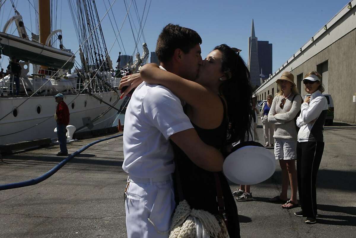 Zaimara Vera rushes to kiss her boyfriend Fabian San Martin as he got off the Chilean Navy ship the Esmeralda in San Francisco Calif., on July 21, 2011.
