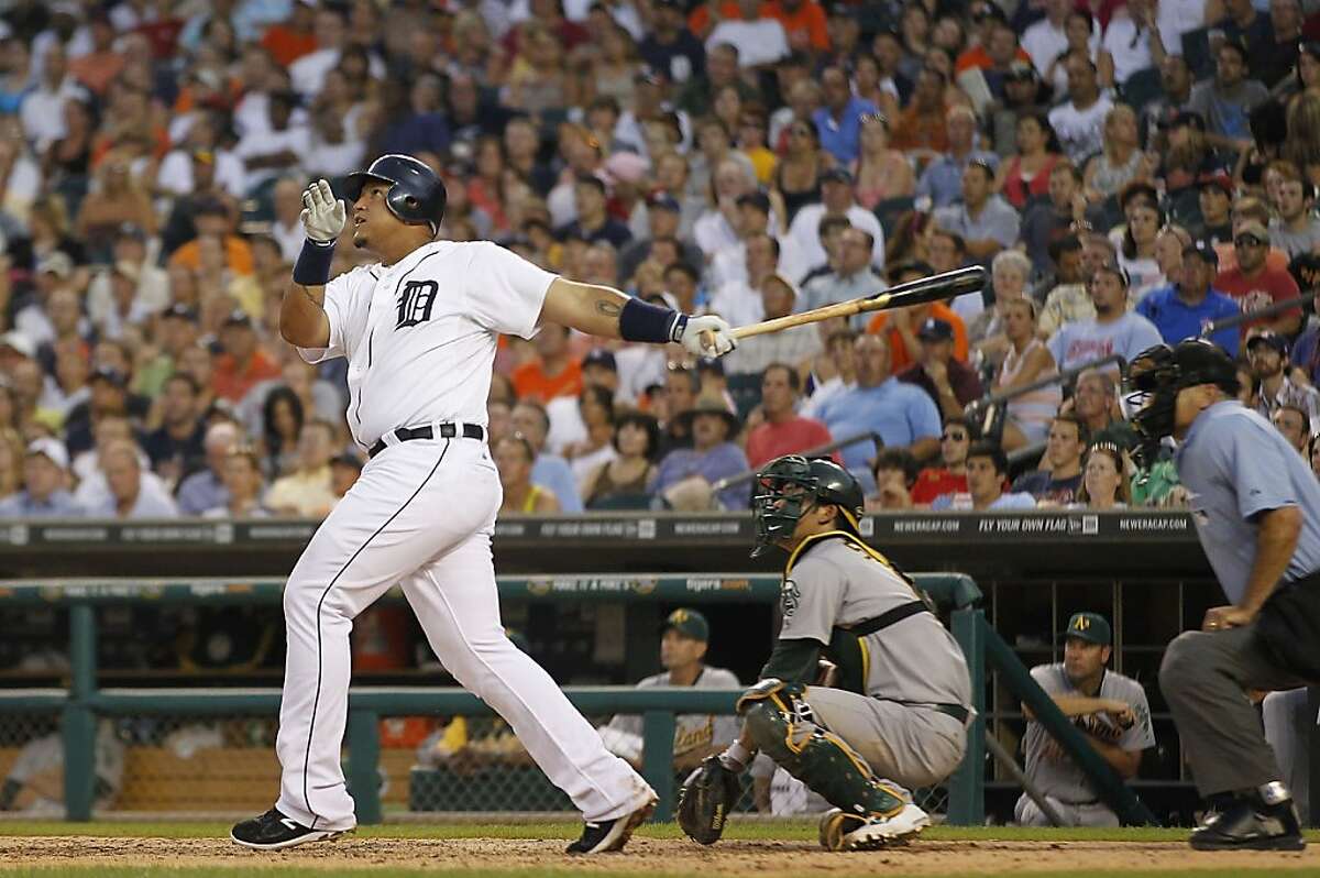 Tigers pound and dance their way past A's