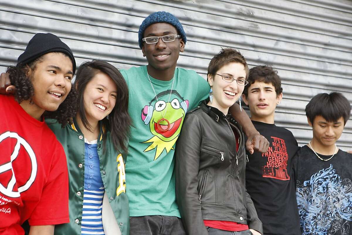 E. J. Walls, 18, left, Jade Cho, 18, Joshua Merchant, 19, Cassandra Euphrat, 18, Noah Silverman, 15, and Bryant Phan, 18, are all members of Youth Speaks, a poetry sam group, pose on Friday, July 15, 2011 in San Francisco, Calif. Youth speaks will be one of six competitors representing the Bay Area in the BNV poetry slam finals.