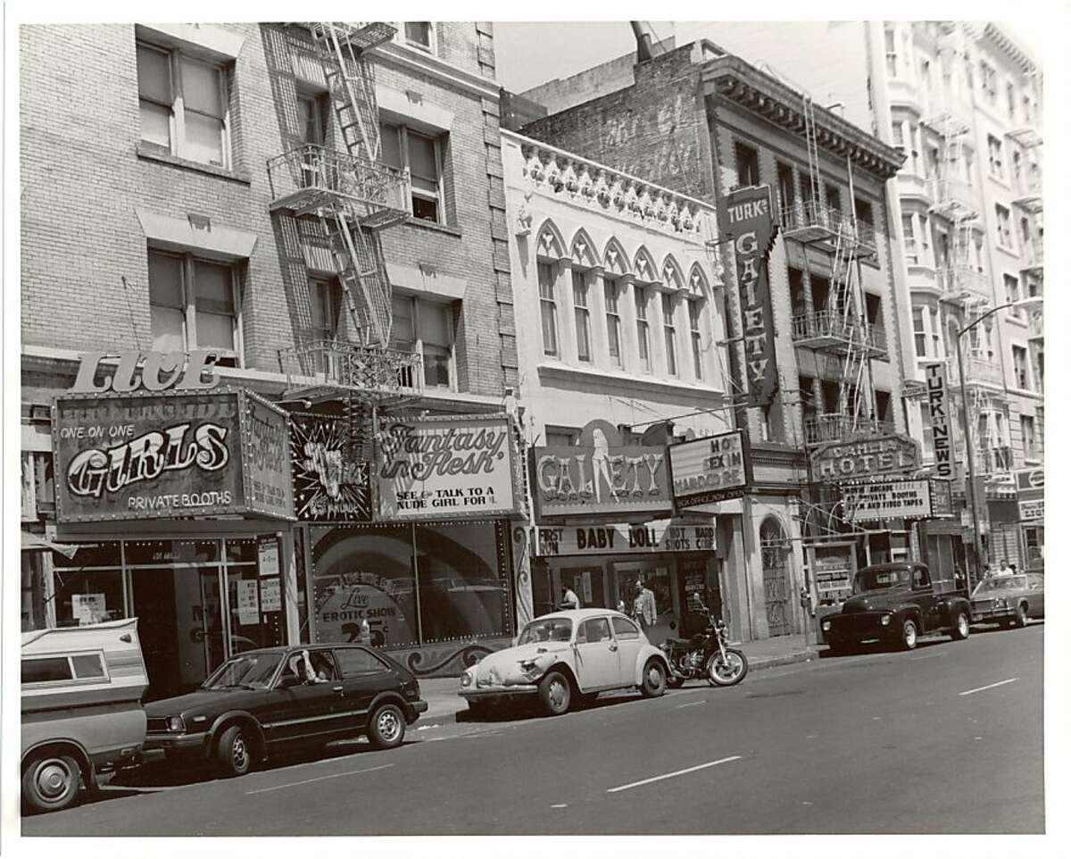 This is a shot of all the adult theatres on Turk Street from the 1970s. The street was a thriving area for pornography at the time.