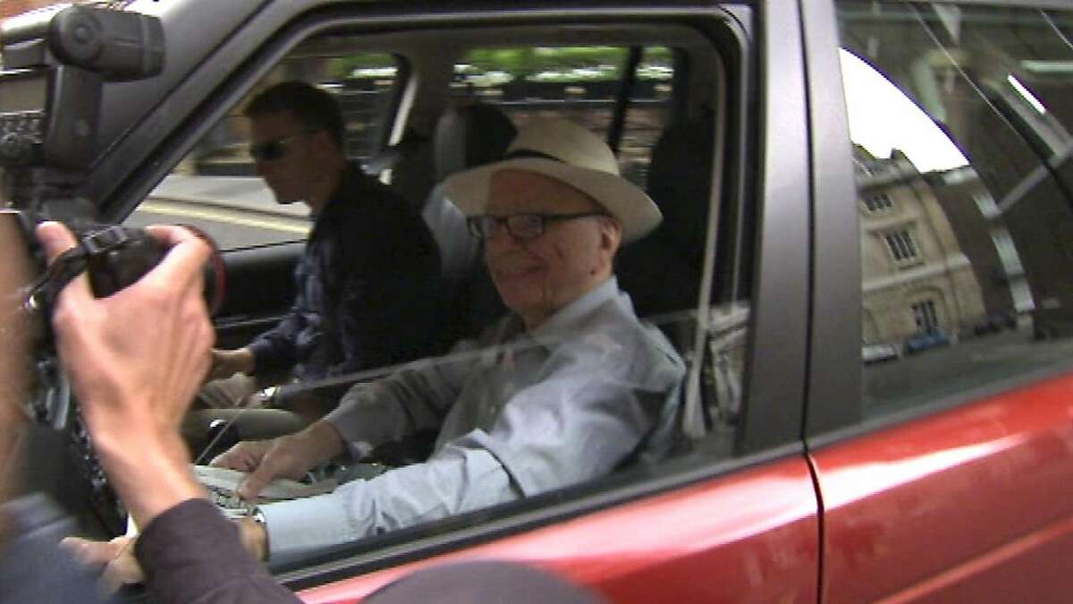 Rupert Murdoch takes charge of newspaper scandal