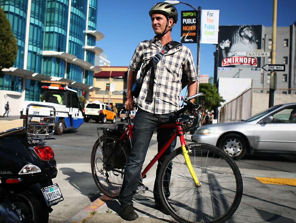 Ed Campaniello stands with his bike on 5th Street in San Francisco on July 7, 2011. Campaniello bikes from the Mission to his job as a consultant at the Hub despite a Canadian study that found that cyclists experience heart irregularities after riding in heavy traffic.
