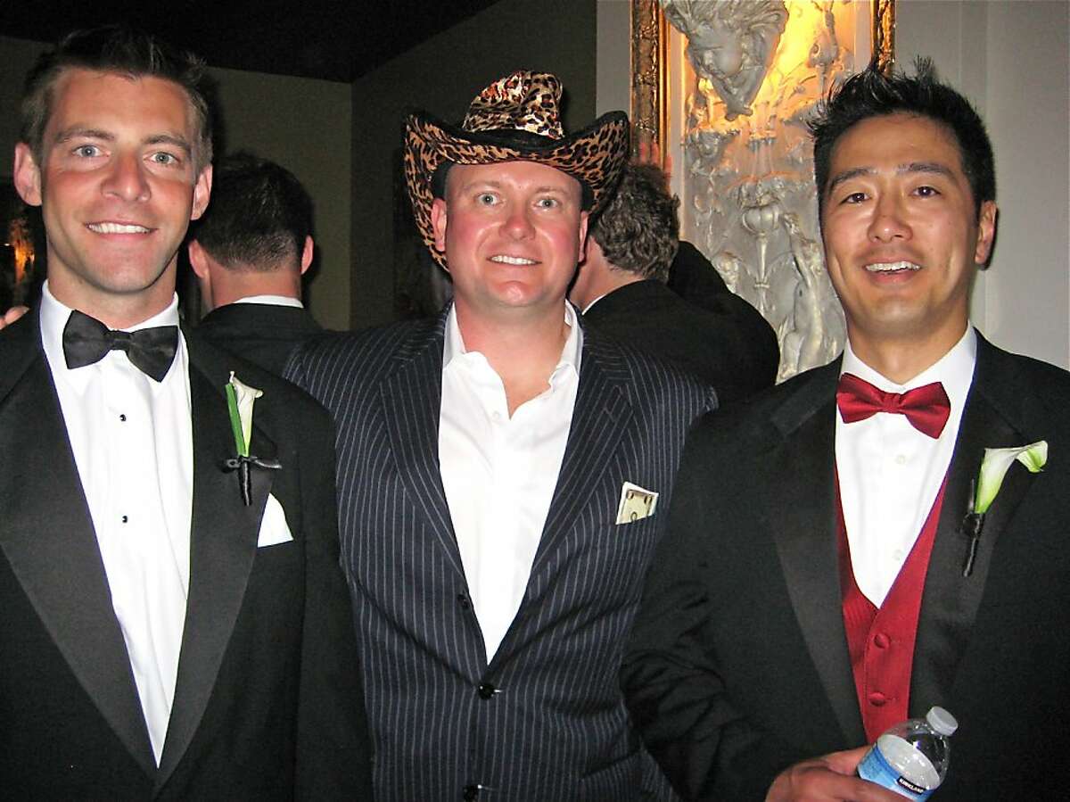 Neal Mueller (left) with Guardsmen President Marc Baluda and Larry Chiang at the Guardsmen Bachelor Auction. June 2011. By Catherine Bigelow.