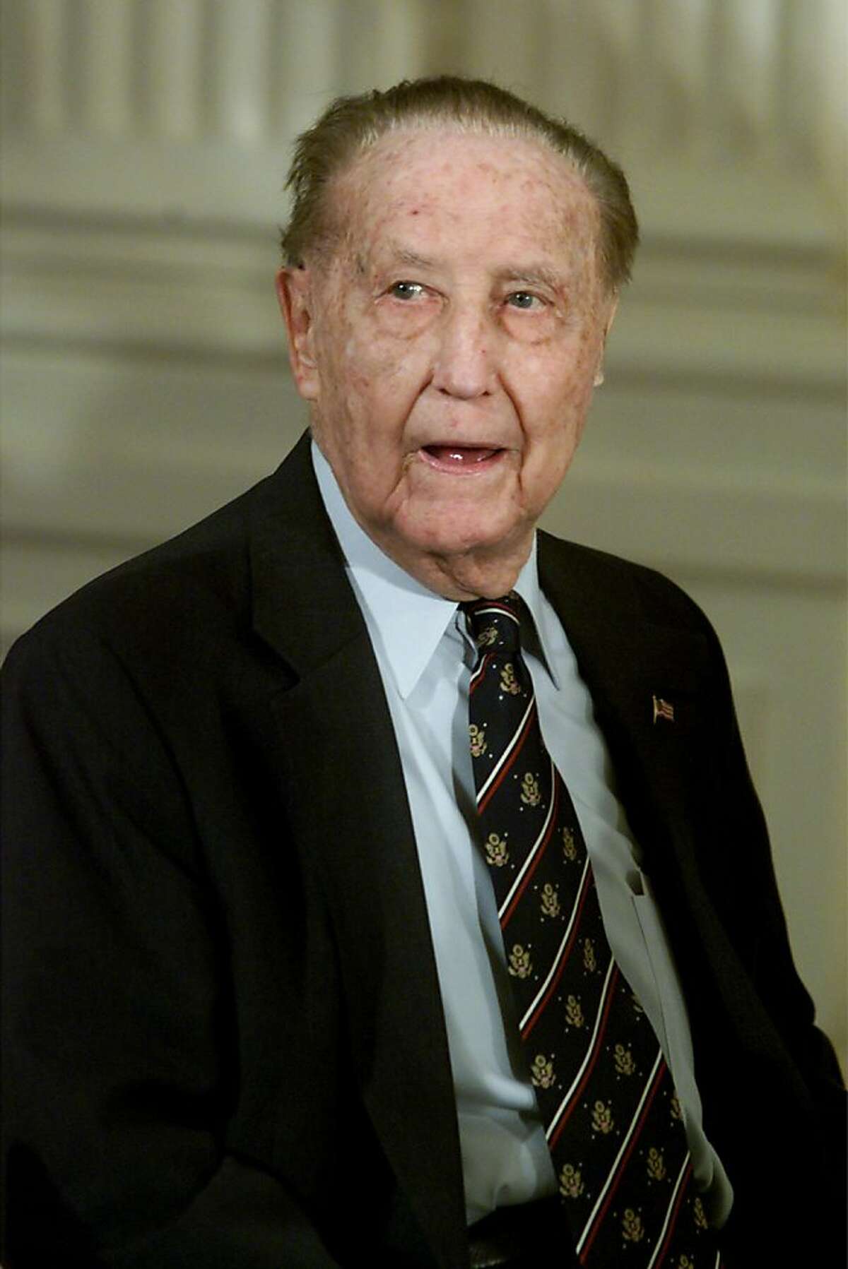 FILE--  U.S. Senator Strom Thurmond of South Carolina listens to U.S. President George W. Bush announce his Federal Judicial nominees in the East Room of the White House May 9, 2001 in Washington, DC.