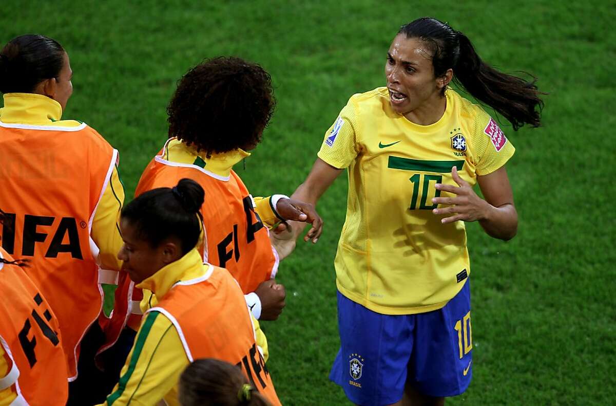 Marta scores twice, Brazil moves to quarters