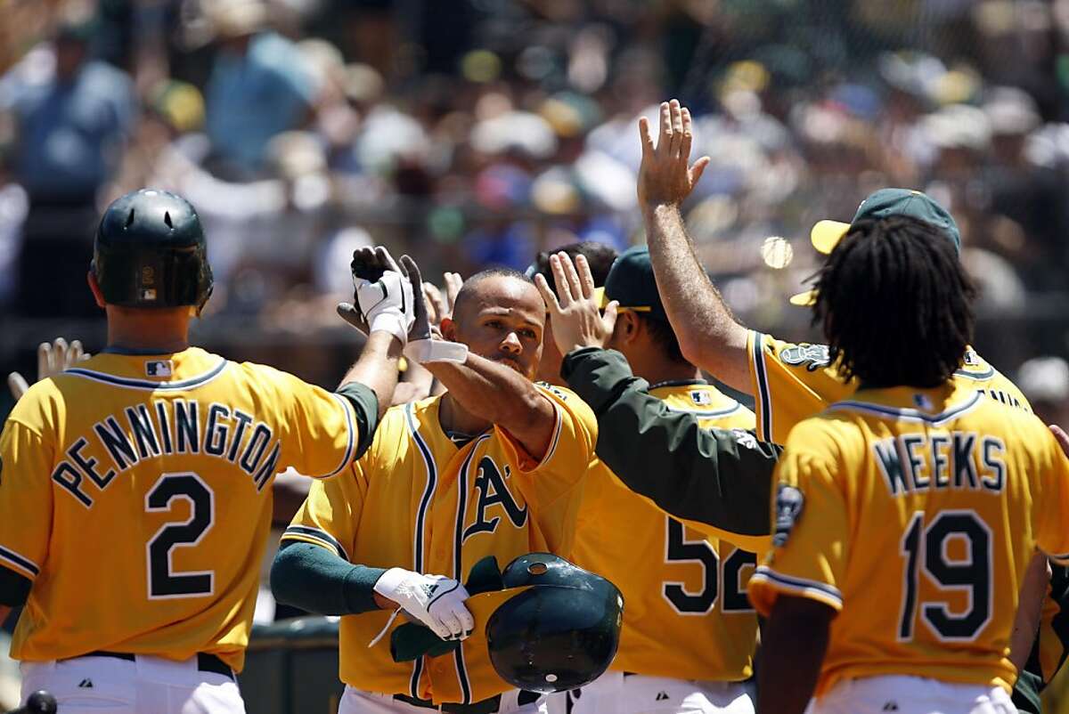 Coco Crisp and his son celebrating in the locker room