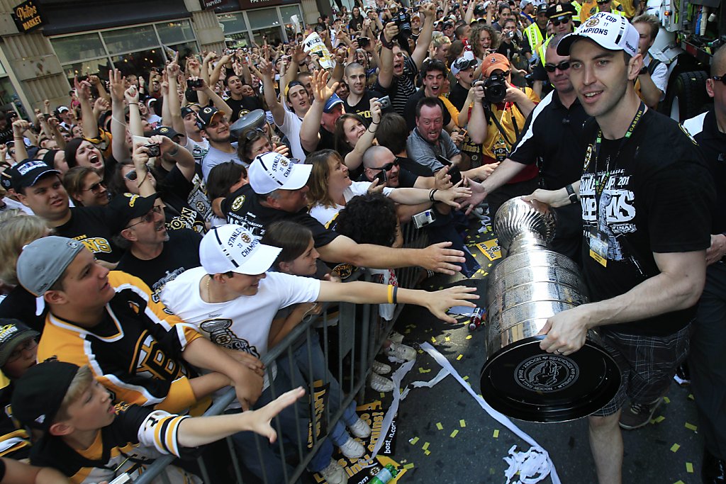Boston Bruins captain, Zdeno Chara, hoists the Stanley Cup for the