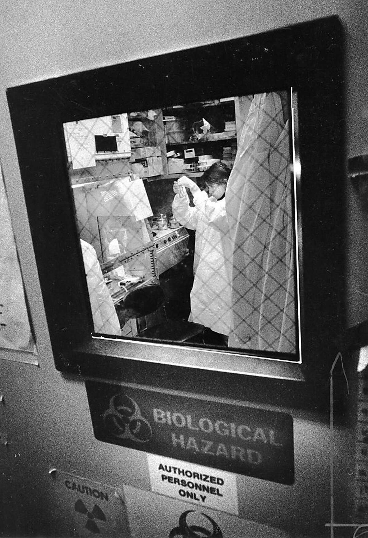 January 26th, 1989 - UCSF AIDS Immunobiology Research Institute. Isabelle Gaston, research assistant working on blood isolation within the Bio Hazards Facility.