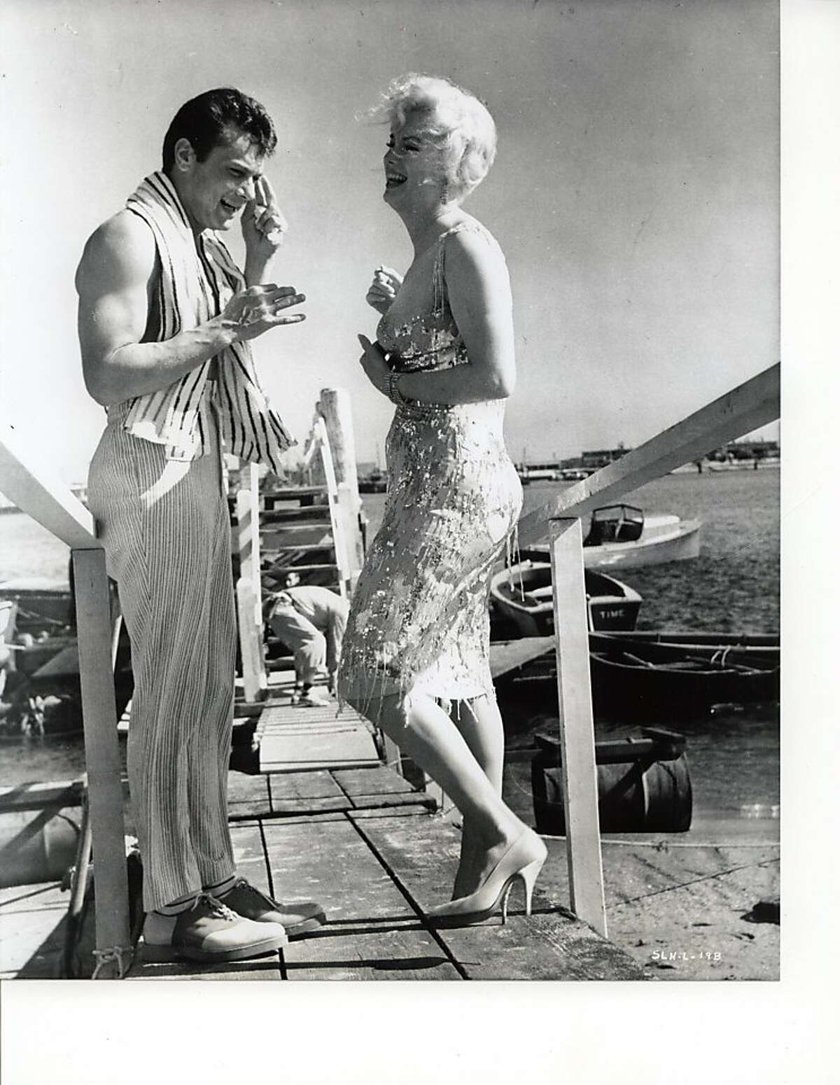 Tony Curtis and Marilyn Monroe on the set of "Some Like it Hot."