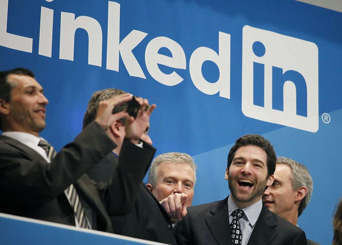 Jeff Weiner, second from right, LinkedIn's CEO, celebrates the company's listing, Thursday, May 19, 2011 at the New York Stock Exchange. LinkedIn, based in Mountain View, Calif., is an internet-based social networking rolodex for business people.
