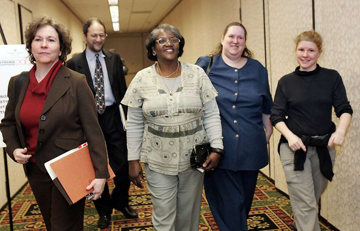 Plaintiffs' counsel Elizabeth Lawrence (left), head counsel Brad Seligman and plaintiffs Betty Dukes, Patricia Surgeson and Christine Kwapnoski leave a 2007 news conference together.