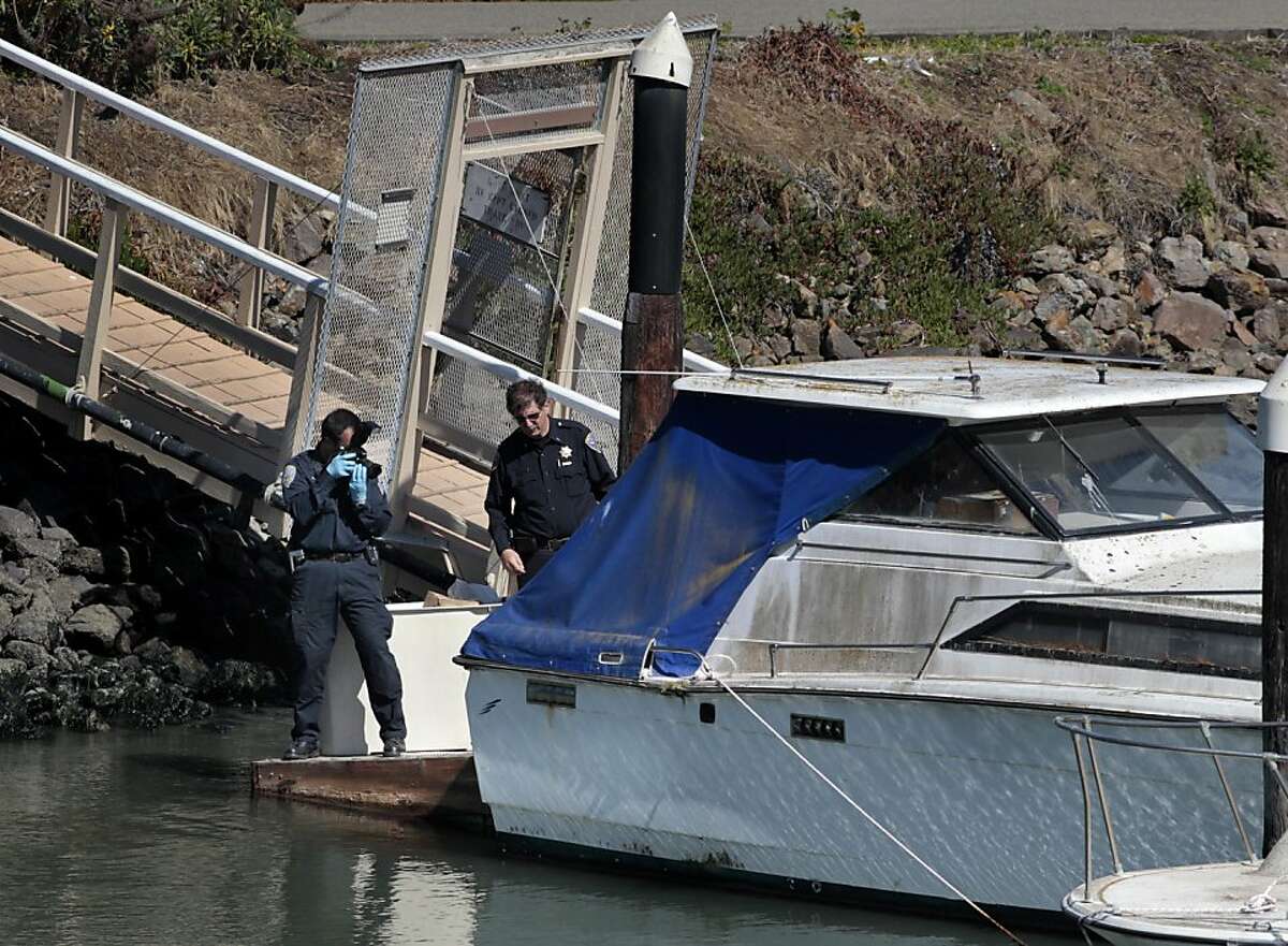 San Francisco Police and Medical Examiners investigate the body of a white male found floating in the water near San Francisco's Fort Mason, Tuesday June 21, 2011 in San Francisco, Calif. After discovering a trail of blood in the area the officials are calling it a homicide.