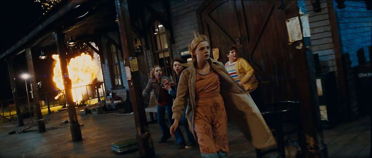 Left to right: Ryan Lee plays Cary, Joel Courtney plays Joe Lamb, Elle Fanning plays Alice Dainard, and Riley Griffiths plays Charles in SUPER 8, from Paramount Pictures.