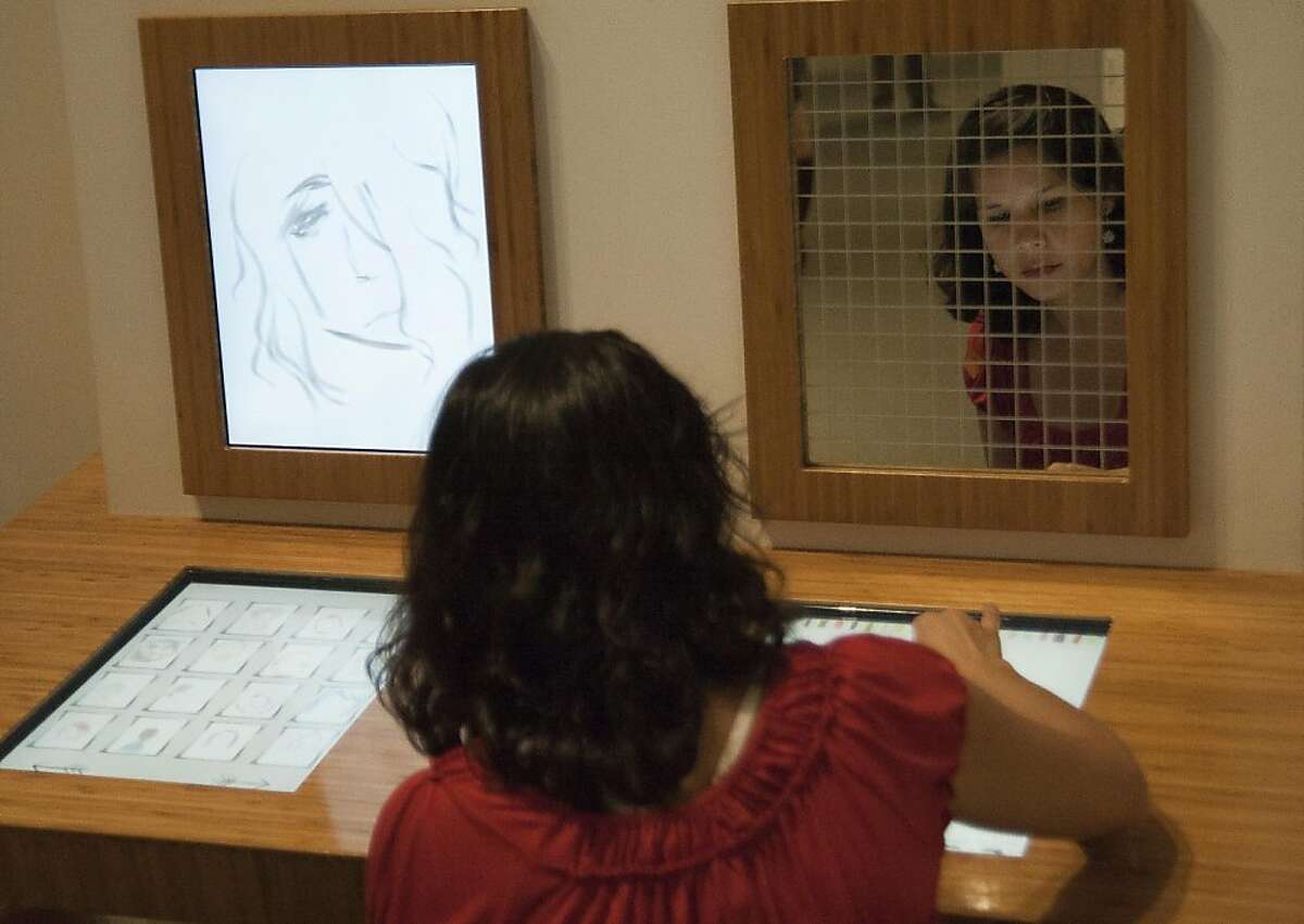 Carolina Martinez interacts with a drawing pad at the Oakalnd Museum of California in Oakland, Calif., on Wednesday, June 8, 2011.