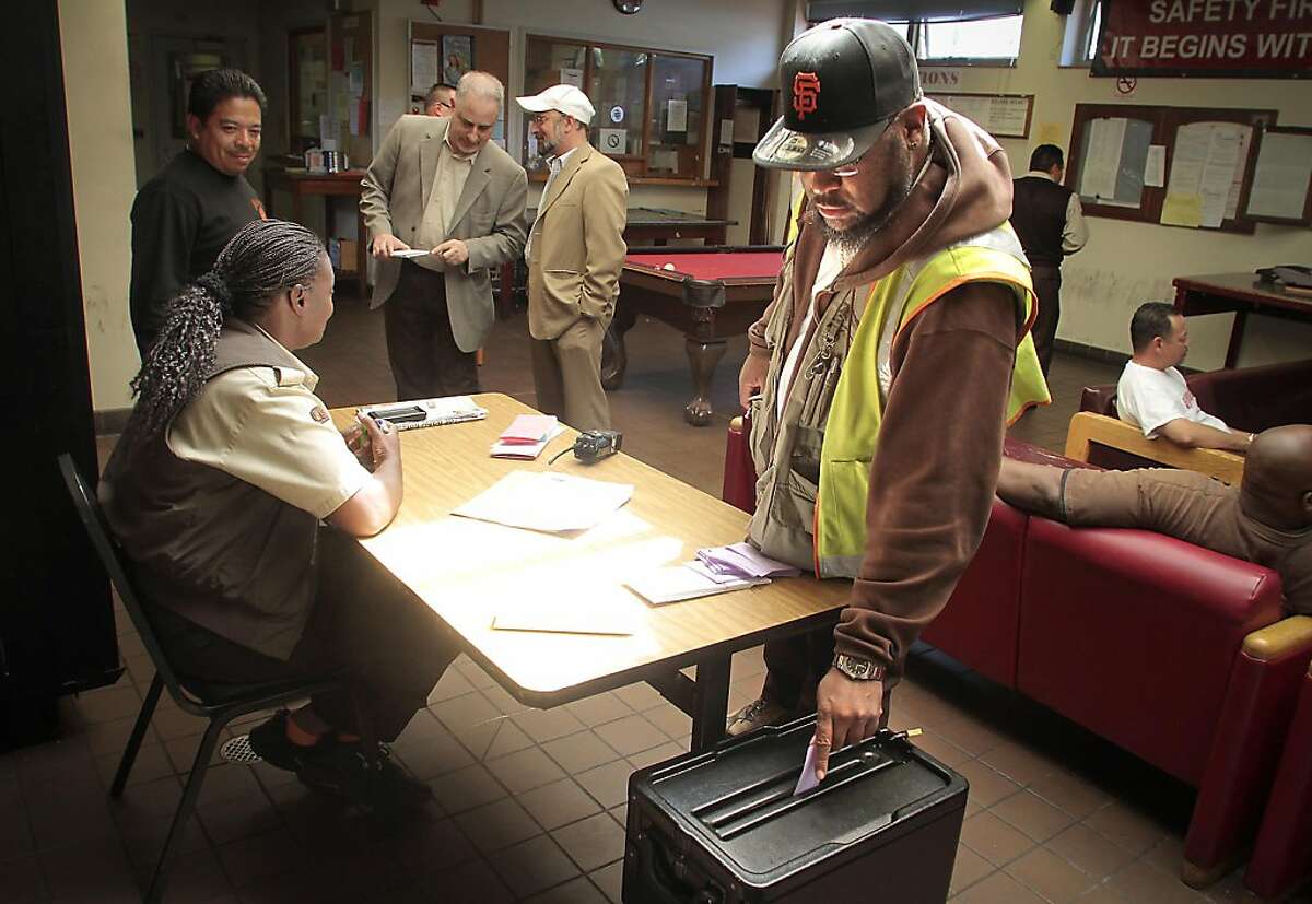 Cale Car operator Tsombe Wolfe puts his vote in the ballot box at the Cable Car barn. San Francisco Municipal Transit operators vote on ratification of a new contract in San Francisco, Calif., on May 8th, 2011.