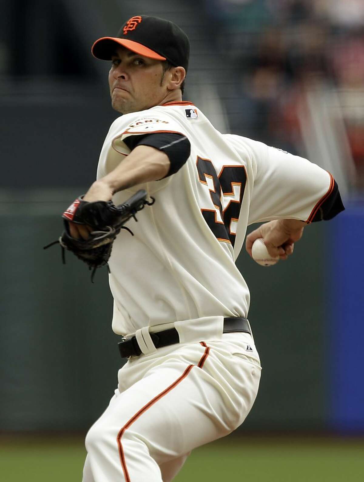 San Francisco Giants pitcher Ryan Vogelsong (32) throws to the Colorado Rockies during the first inning of a baseball game in San Francisco, Sunday, June 5, 2011.