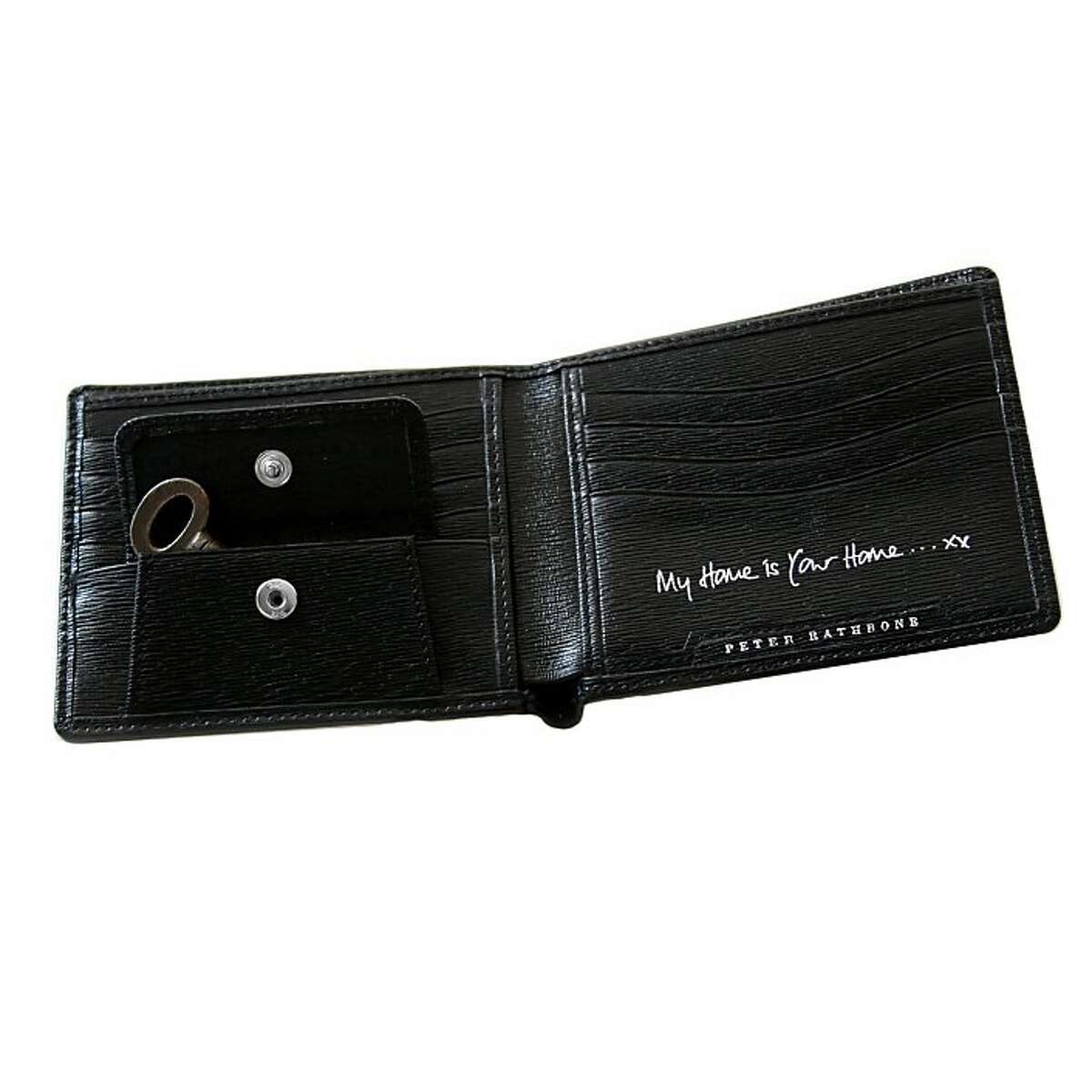 Tell him what you mean, in your own words, in your own writing. Custom-engraved London grain leather wallet, starting at $280, www.anyahindmarch.com. Maybe he’ll open up in return.